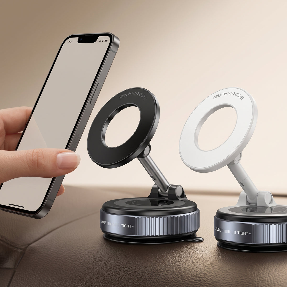 Hand placing smartphone onto black magnetic car mount on dashboard, white variant beside it