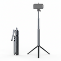 Selfie stick tripod shown folded compact beside fully extended height with phone holder on white background